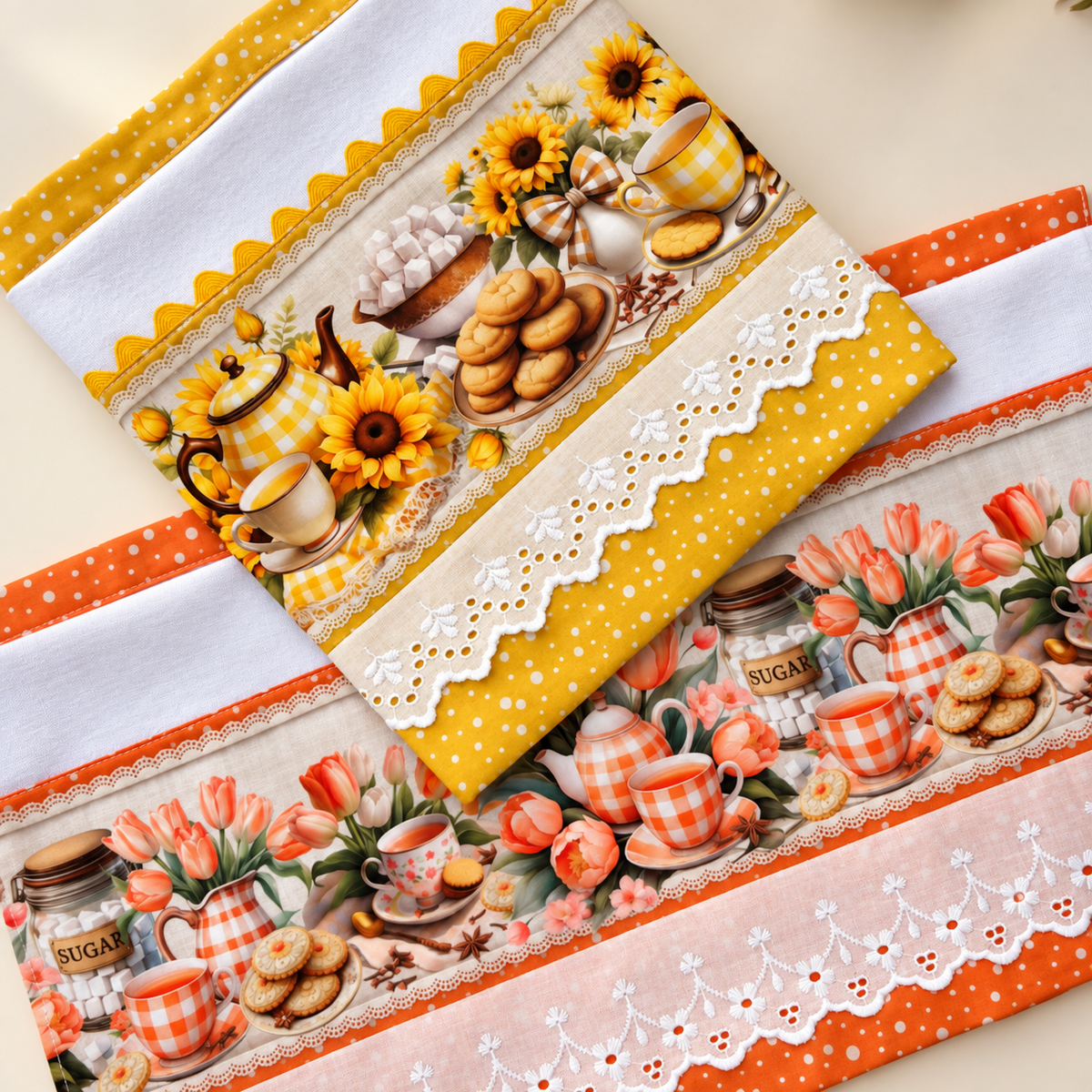 Sunflower and Tulip Tea Time kitchen tea towel set 2-piece close-up flat lay showing yellow sunflower towel with golden polka dot trim and scallop lace border overlapping orange tulip towel with peach gingham tea set print, orange polka dot trim and white eyelet lace border, both on cream surface